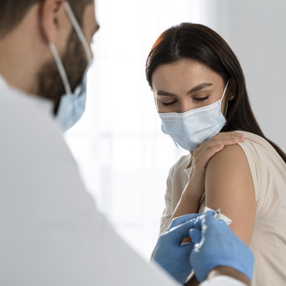 doctor-doing-vaccine-patient